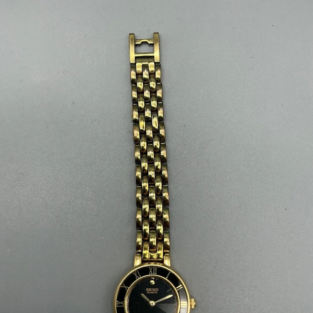 Vintage Seiko Womens Watch 21mm Black Dial Gold Tone 1N00-0D29 New Battery 6.5